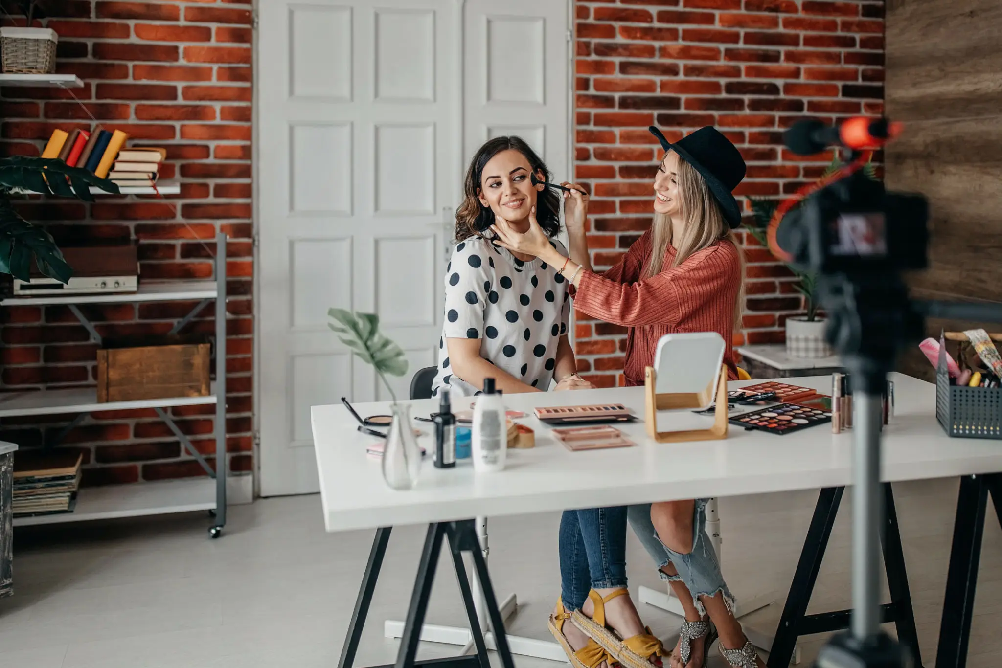 Beauty vlog setup with two women