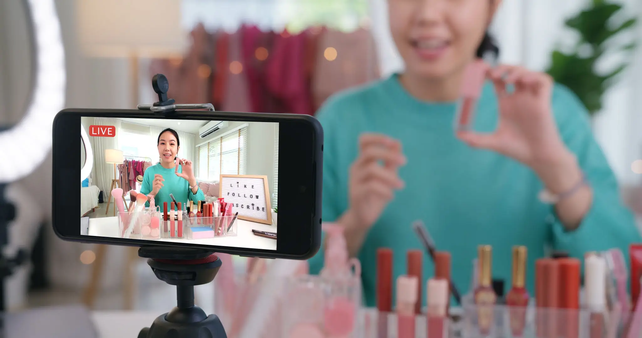 Beauty influencer livestreaming lipstick review