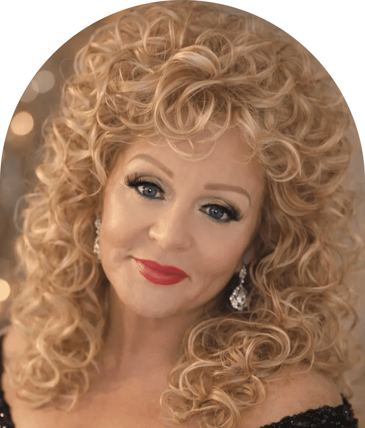 Smiling woman with curly blonde hair