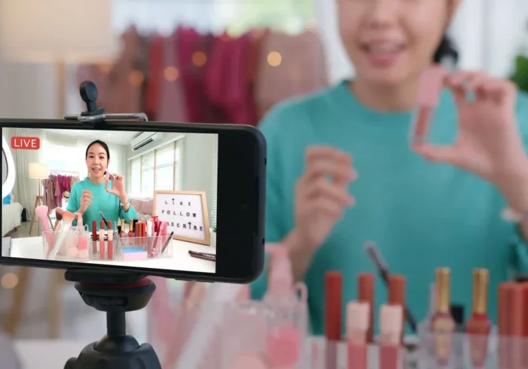 Beauty influencer livestreaming lipstick review